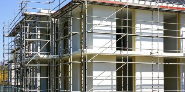 Bouwsector krimpt, maar herstel woningbouw verwacht